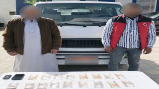 ضبط سائقين بحوزتهما مبالغ مالية لشراء أصوات الناخبين في أبو حمص