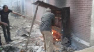 ملك الكيف وراء حرق كابينه تليفونات حلوان