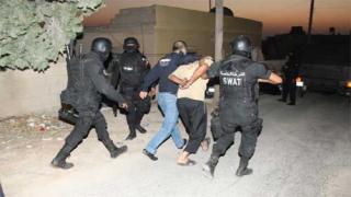 القبض علي متهم .أرشيفية