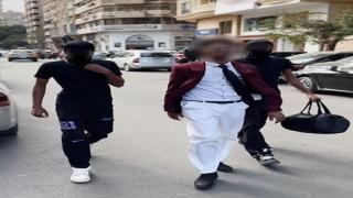 عقب تداول فيديو.. القبض على المتهمين بارتداء أقنعة للوجه والسير بأحد شوارع الجيزة